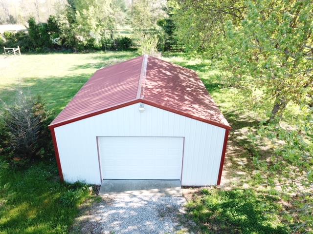 309 Butler Road Portland, TN 37148 - Photo 26 of 30 a house with trees in the background