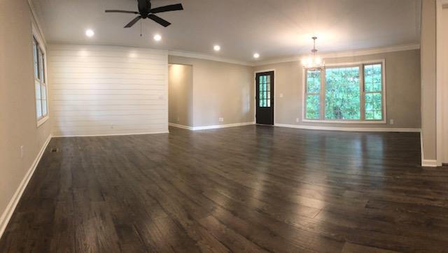 309 Butler Road Portland, TN 37148 - Photo 10 of 30 an empty room with wooden floor and windows