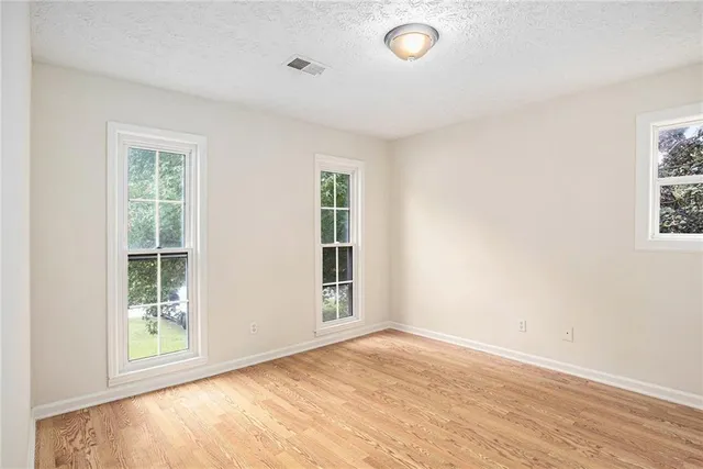 an empty room with windows