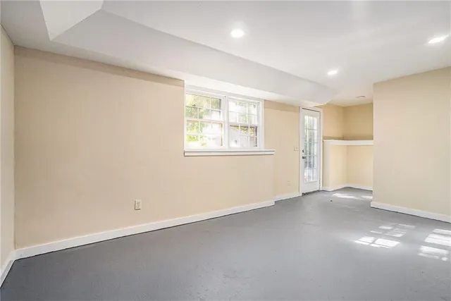 an empty room with windows