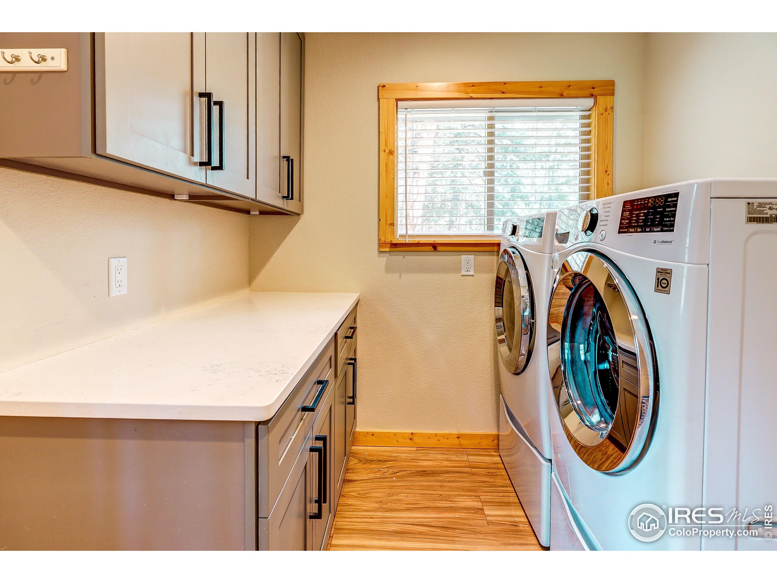 166 Cherokee Road Lyons, CO 80540 - Photo 14 of 38 a utility room with dryer and washer