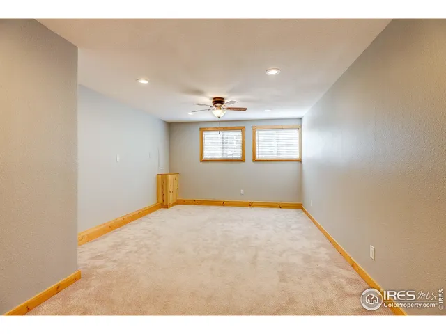 a view of a room with white walls