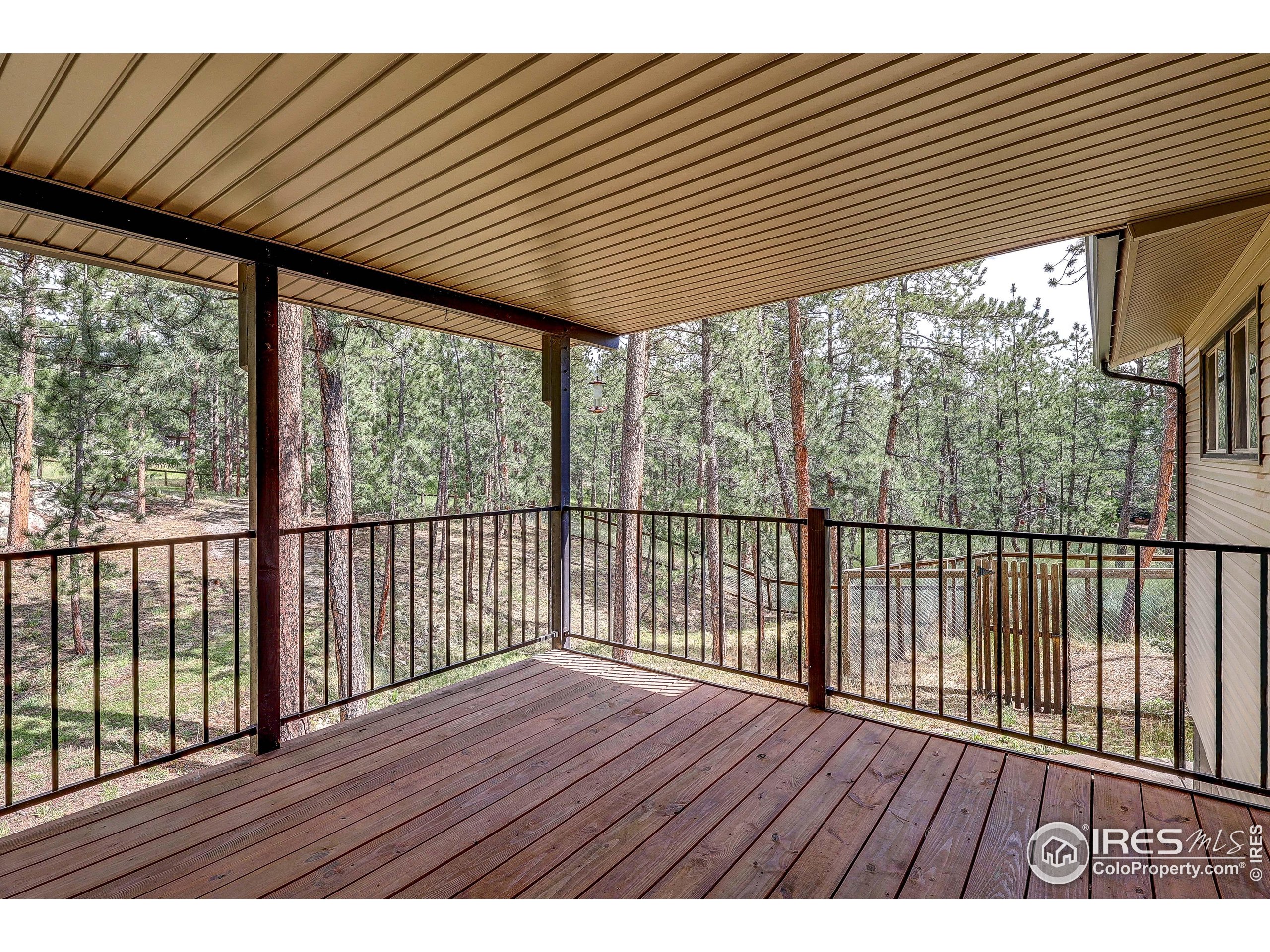 166 Cherokee Road Lyons, CO 80540 - Photo 23 of 38 a view of balcony with wooden floor