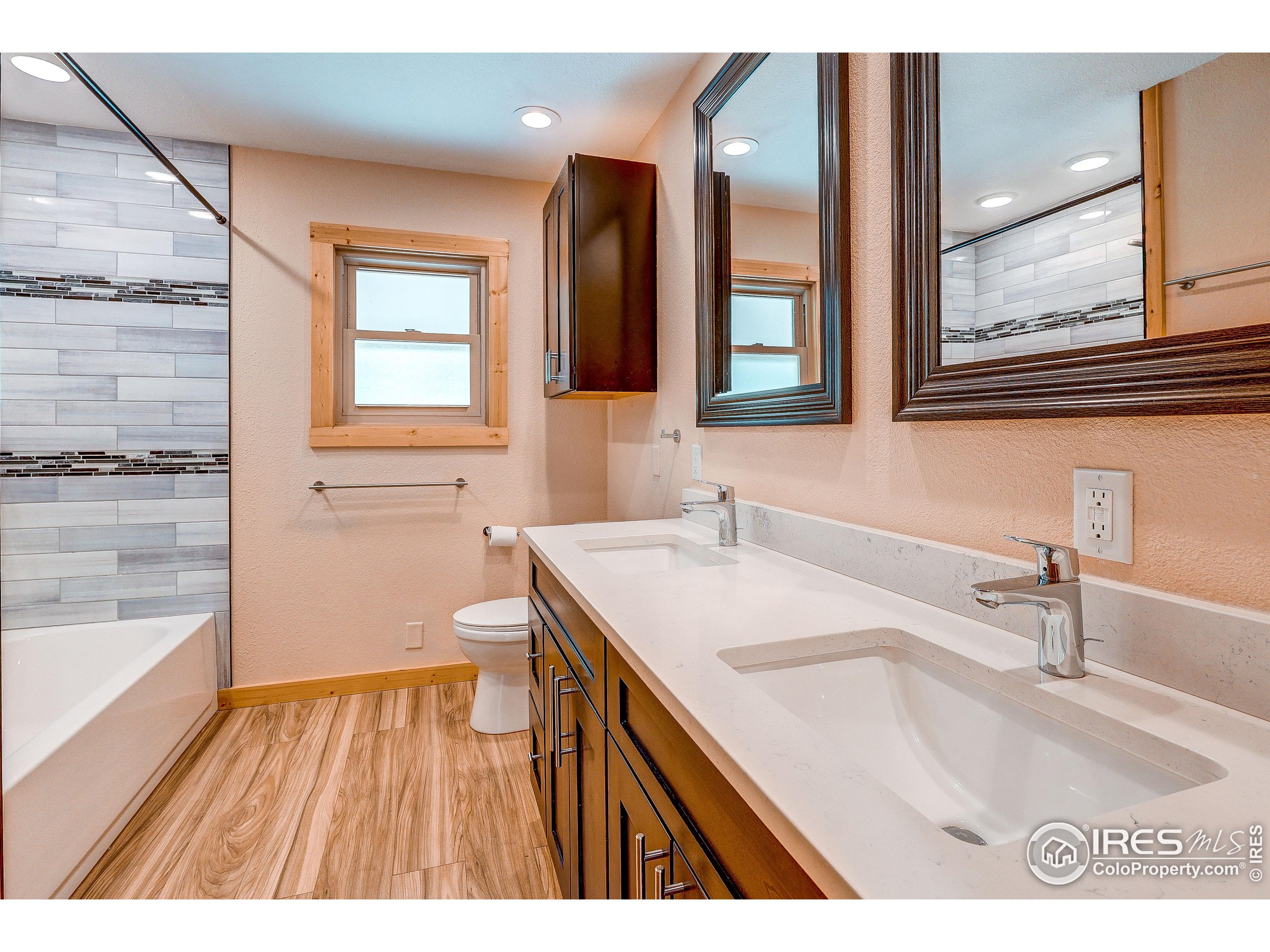 166 Cherokee Road Lyons, CO 80540 - Photo 30 of 38 a bathroom with a sink and a mirror