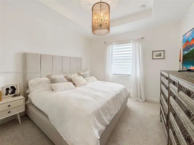 a bathroom with a toilet a sink and shower