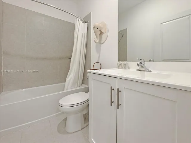 a bathroom with a sink a vanity and a mirror