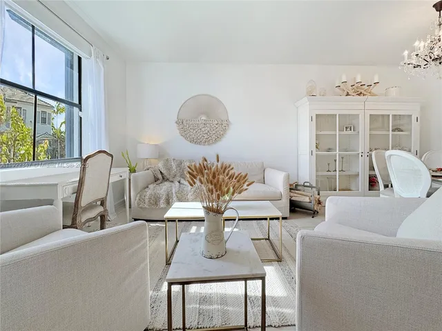 a living room with furniture and window