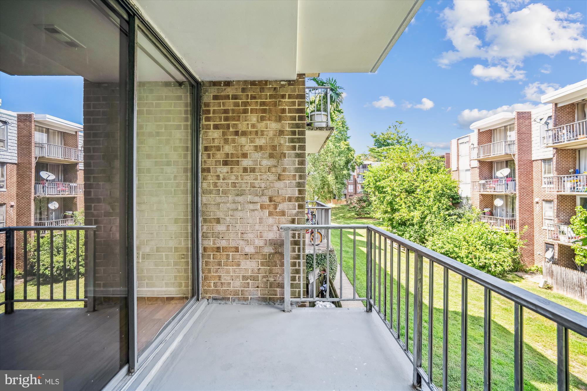 3946 Bel Pre Road, Unit 4 Silver Spring, MD 20906 - Photo 16 of 30 a view of a balcony with an outdoor space