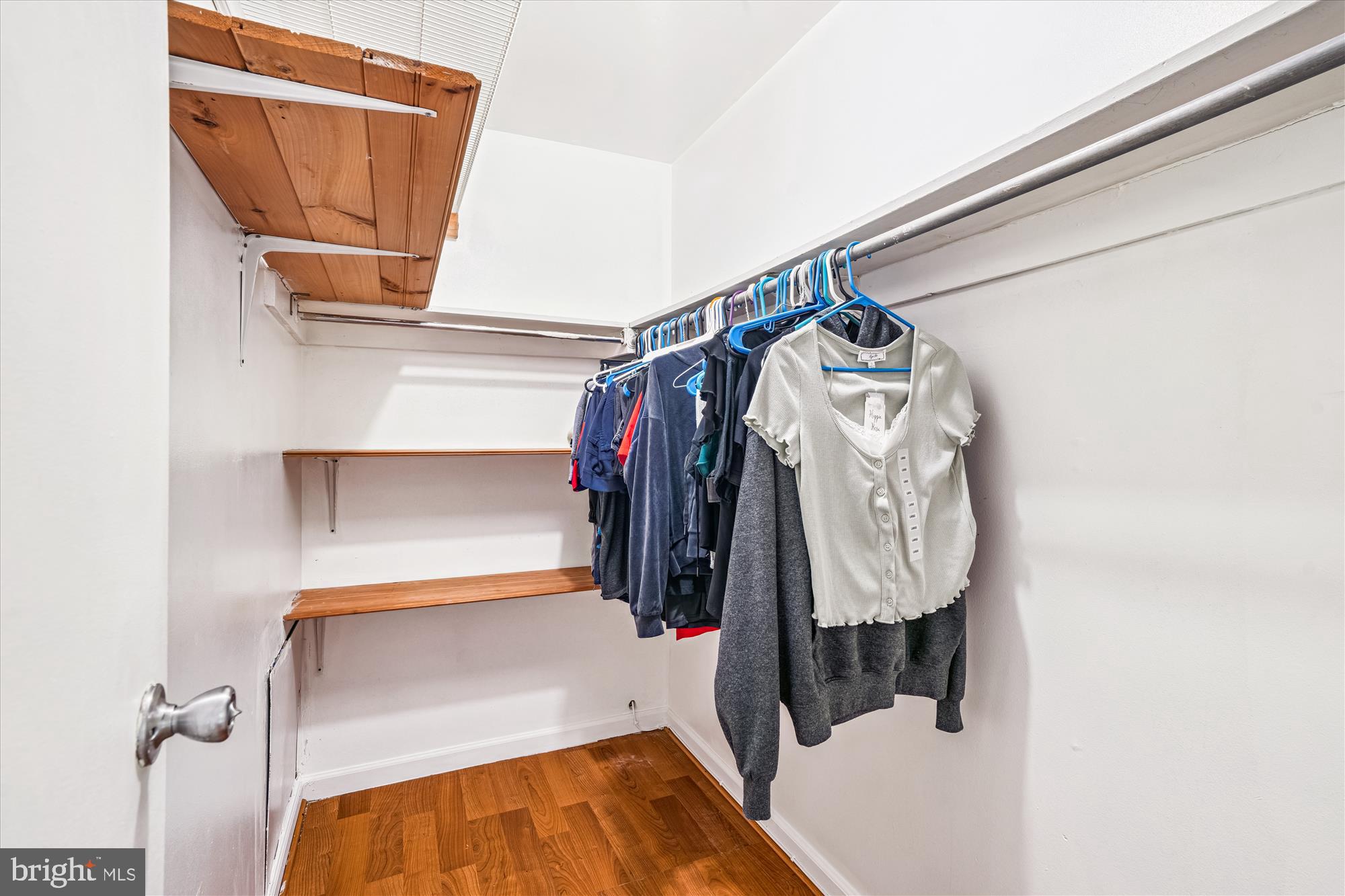 3946 Bel Pre Road, Unit 4 Silver Spring, MD 20906 - Photo 18 of 30 a view of walk in closet with clothes and shoes