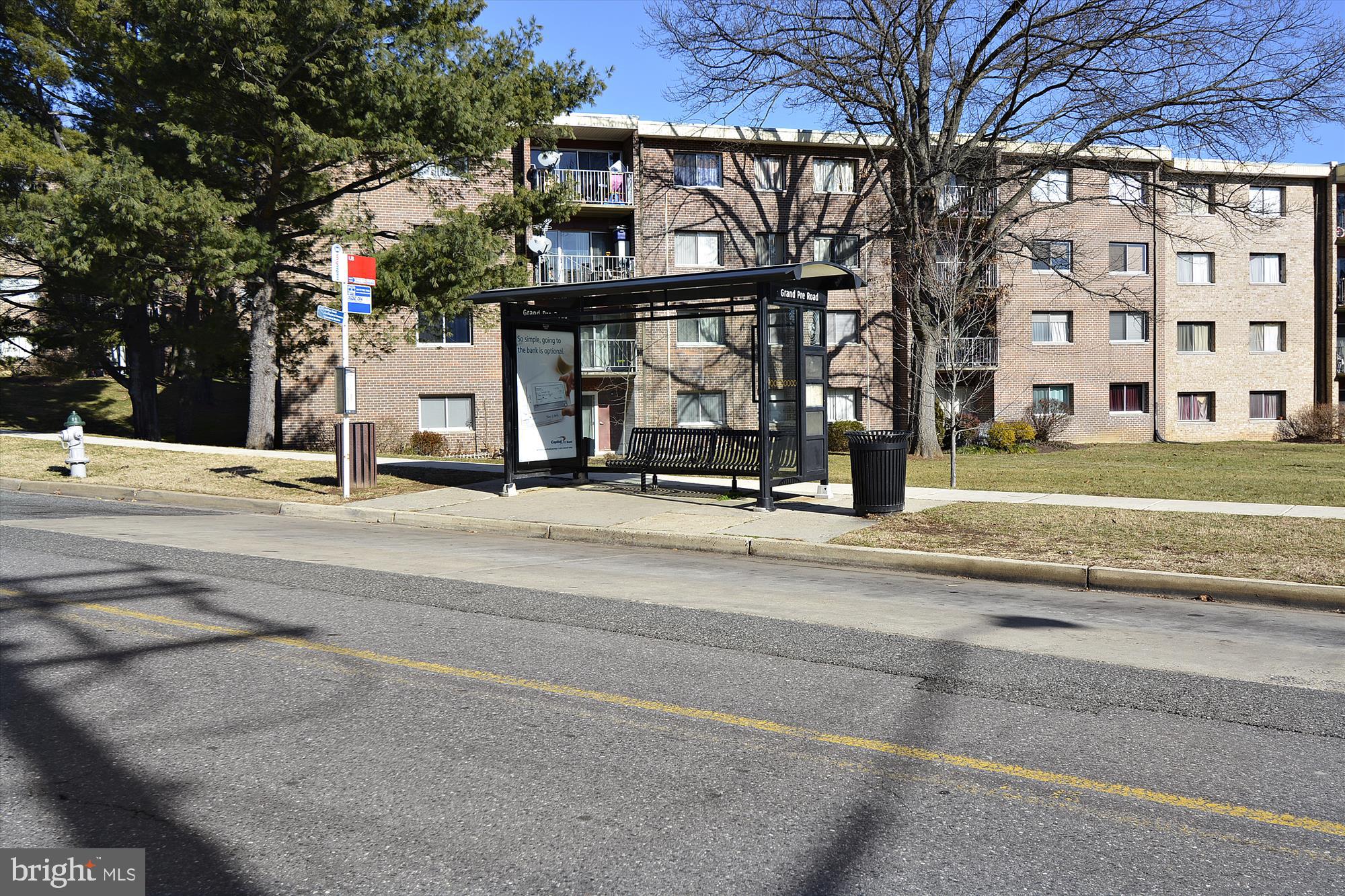 3946 Bel Pre Road, Unit 4 Silver Spring, MD 20906 - Photo 26 of 30 front view of a building with a street