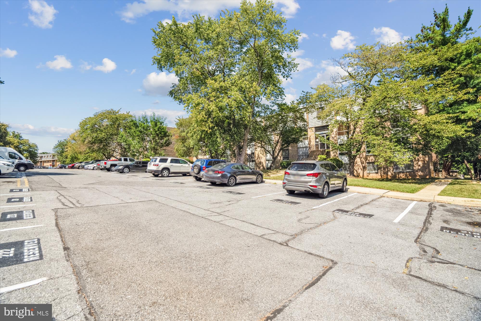 3946 Bel Pre Road, Unit 4 Silver Spring, MD 20906 - Photo 30 of 30 a view of car parked on the side of the road
