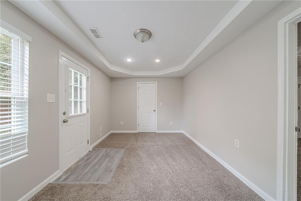 2183 Ramblewood Circle Decatur, GA 30035 - Photo 21 of 37 a view of an empty room with a window