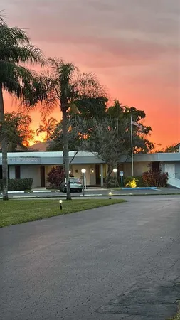 a view of road with house in background