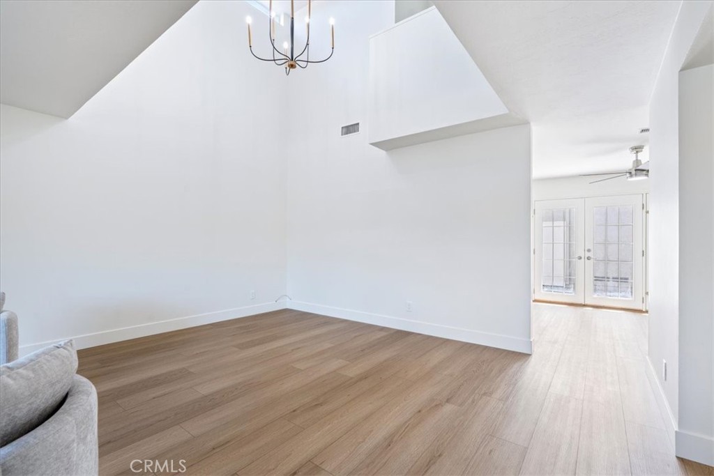 4 Wintergreen, Unit 4 Irvine, CA 92604 - Photo 16 of 39 a view of empty room with wooden floor