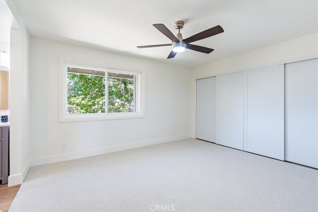 4 Wintergreen, Unit 4 Irvine, CA 92604 - Photo 20 of 39 an empty room with a window and a fan