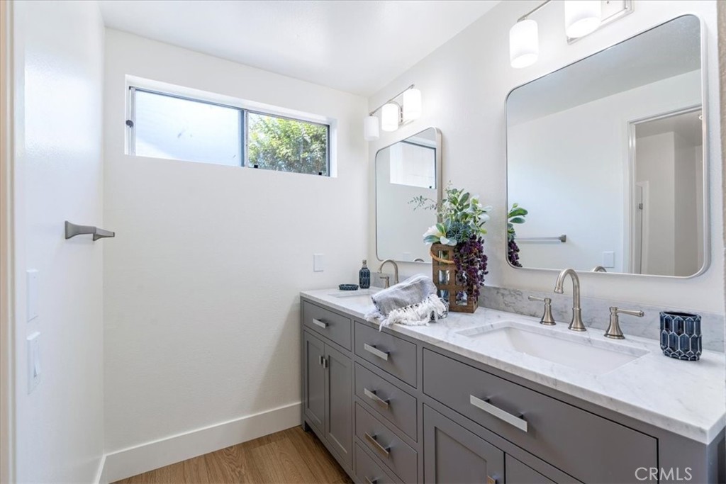 4 Wintergreen, Unit 4 Irvine, CA 92604 - Photo 22 of 39 a bathroom with a sink and a mirror