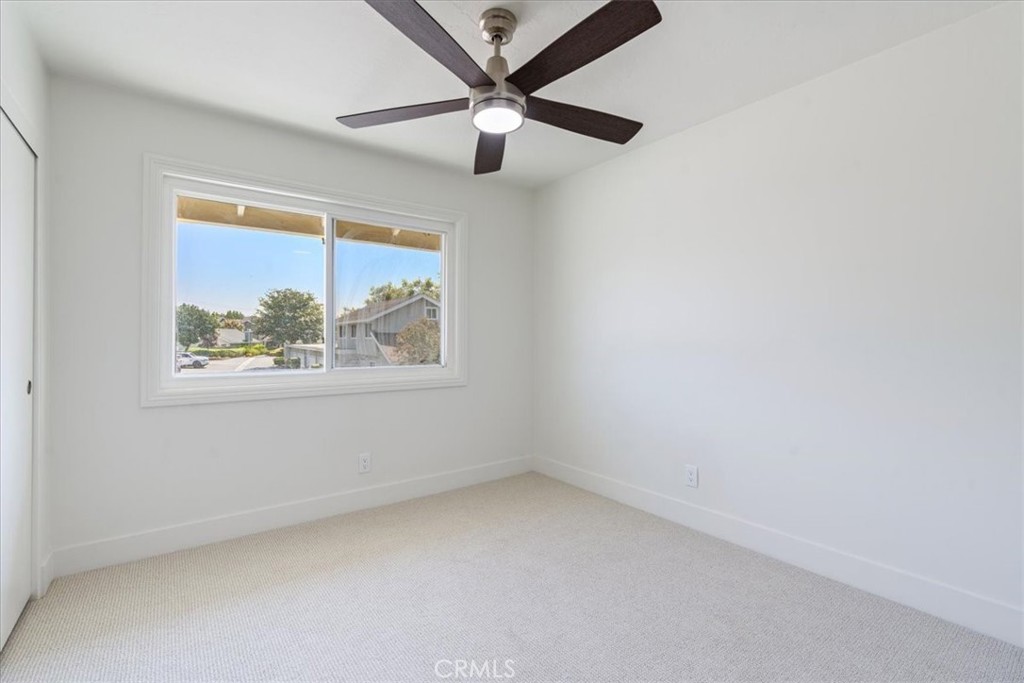 4 Wintergreen, Unit 4 Irvine, CA 92604 - Photo 28 of 39 an empty room with a window and a fan