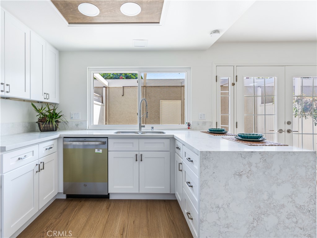 4 Wintergreen, Unit 4 Irvine, CA 92604 - Photo 9 of 39 a spacious bathroom with a granite countertop sink mirror and a