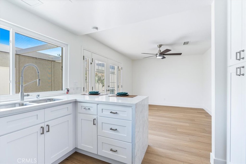 4 Wintergreen, Unit 4 Irvine, CA 92604 - Photo 10 of 39 a spacious bathroom with a granite countertop sink mirror and