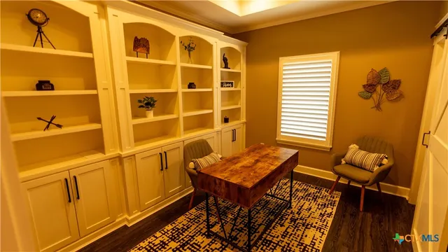 a house with swimming pool in front of it