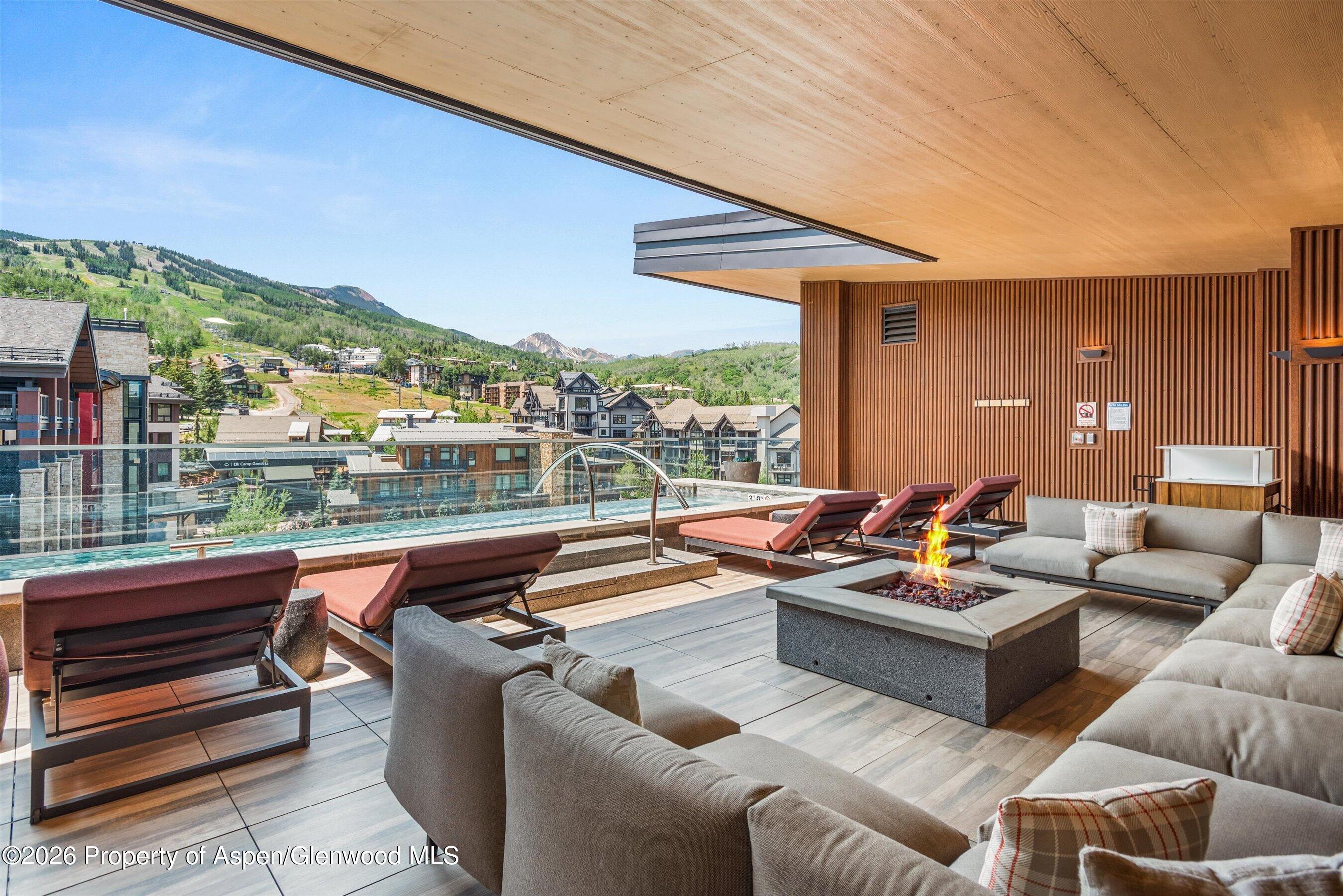 77 Wood Road, Unit 404 EAST Snowmass Village, CO 81615 - Photo 23 of 27 Pool Lounge
