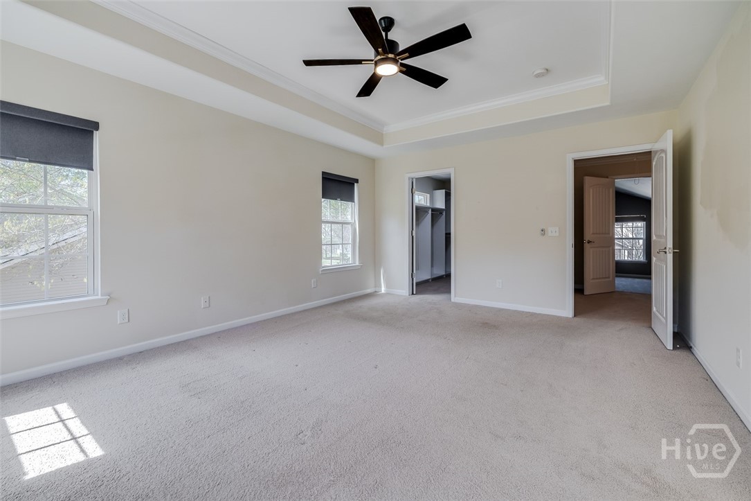 411 Plantation Place Rincon, GA 31326 - Photo 19 of 38 Upstairs primary bedroom with spa like bath and amazing closet.