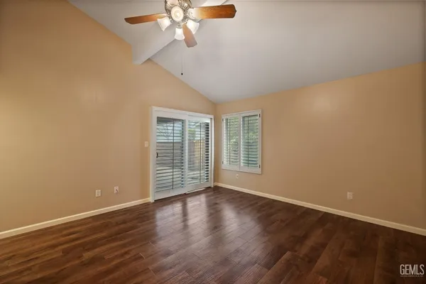 a bathroom with a shower and toilet