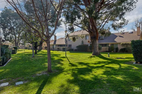 a view of a back yard of the house