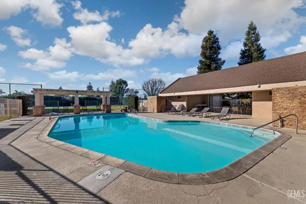 a view of outdoor space with signage and flags
