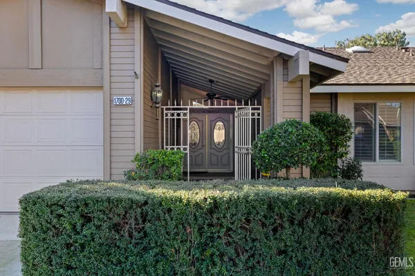 a view of a back yard of the house