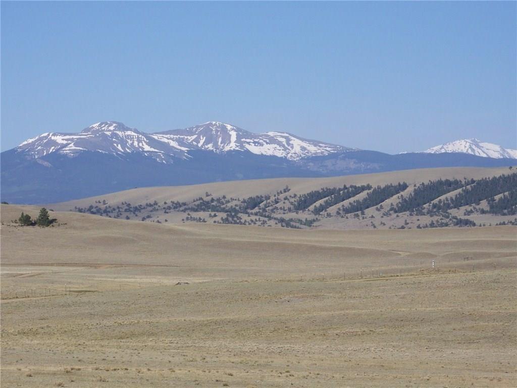 186 Link Road Como, CO 80432 - Photo 2 of 8 a view of mountain with sunset in background
