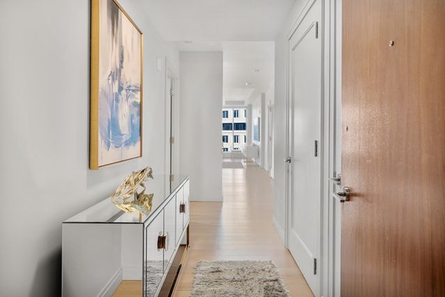 a bathroom with sink and mirror