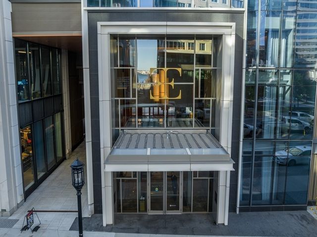 a view of porch with a table and chairs