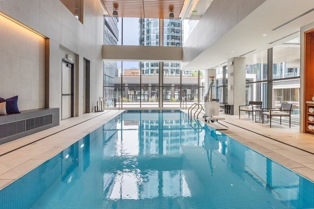 a view of a living room and a balcony