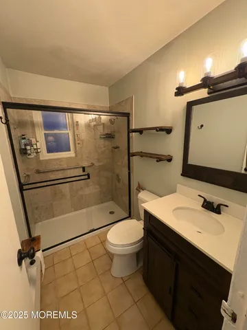 a view of a closet with storage