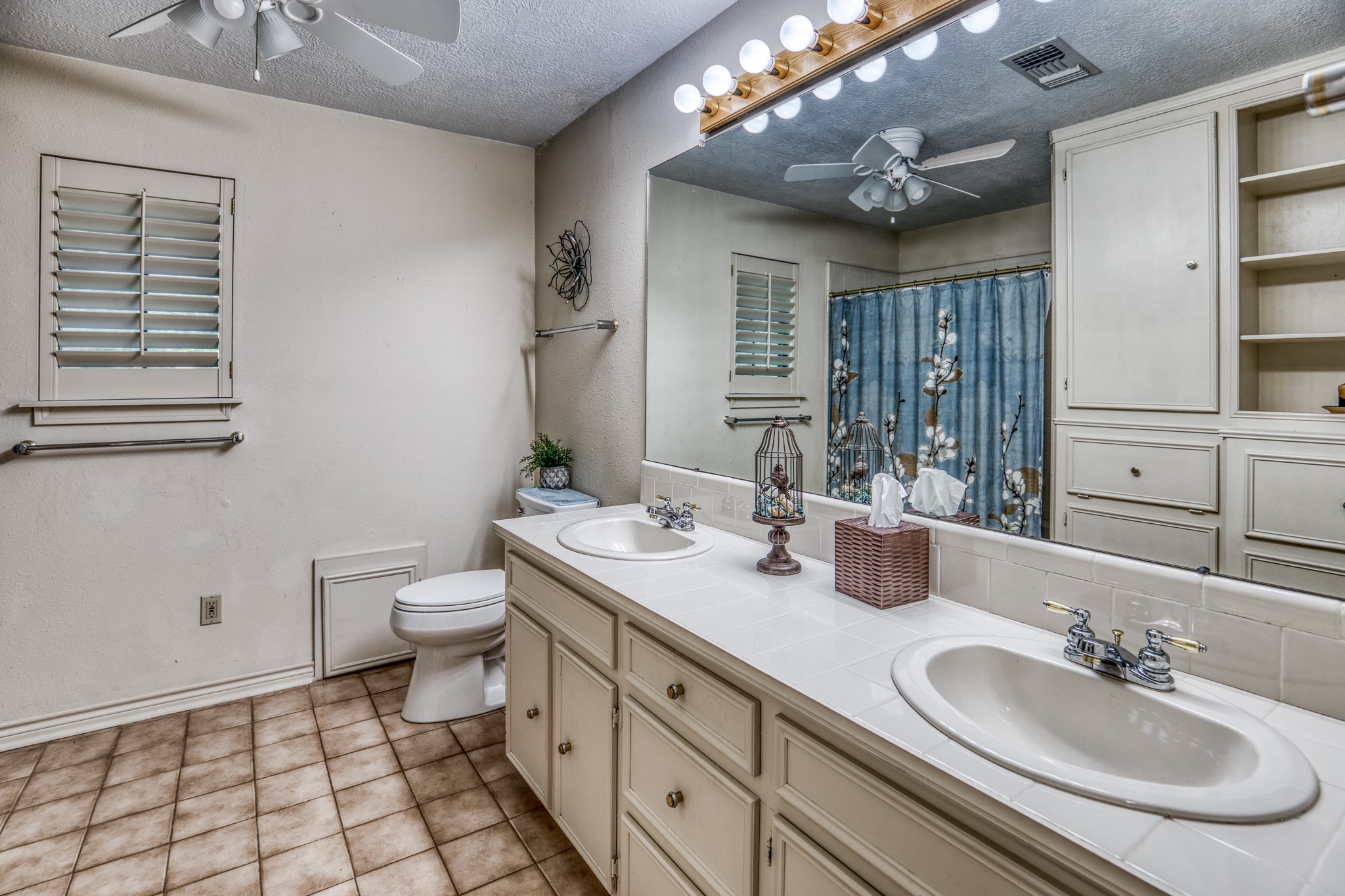 1017 Allen Road Cat Spring, TX 78933 - Photo 21 of 47 a bathroom with a double vanity sink mirror and toilet
