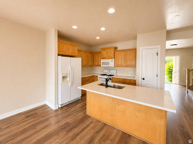 14767 Invergarry Court Draper, UT 84020 - Photo 5 of 18 Modern kitchen with wood-finish flooring, recessed lighting, light-toned cabinetry, and white countertops