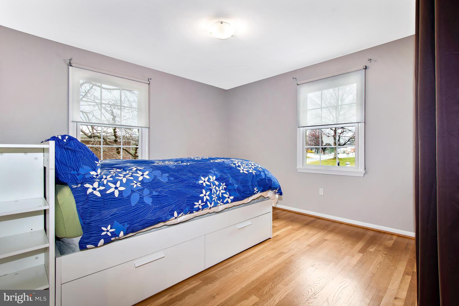 18908 Bloomfield Road Olney, MD 20832 - Photo 15 of 30 a bed sitting in a bedroom next to a window