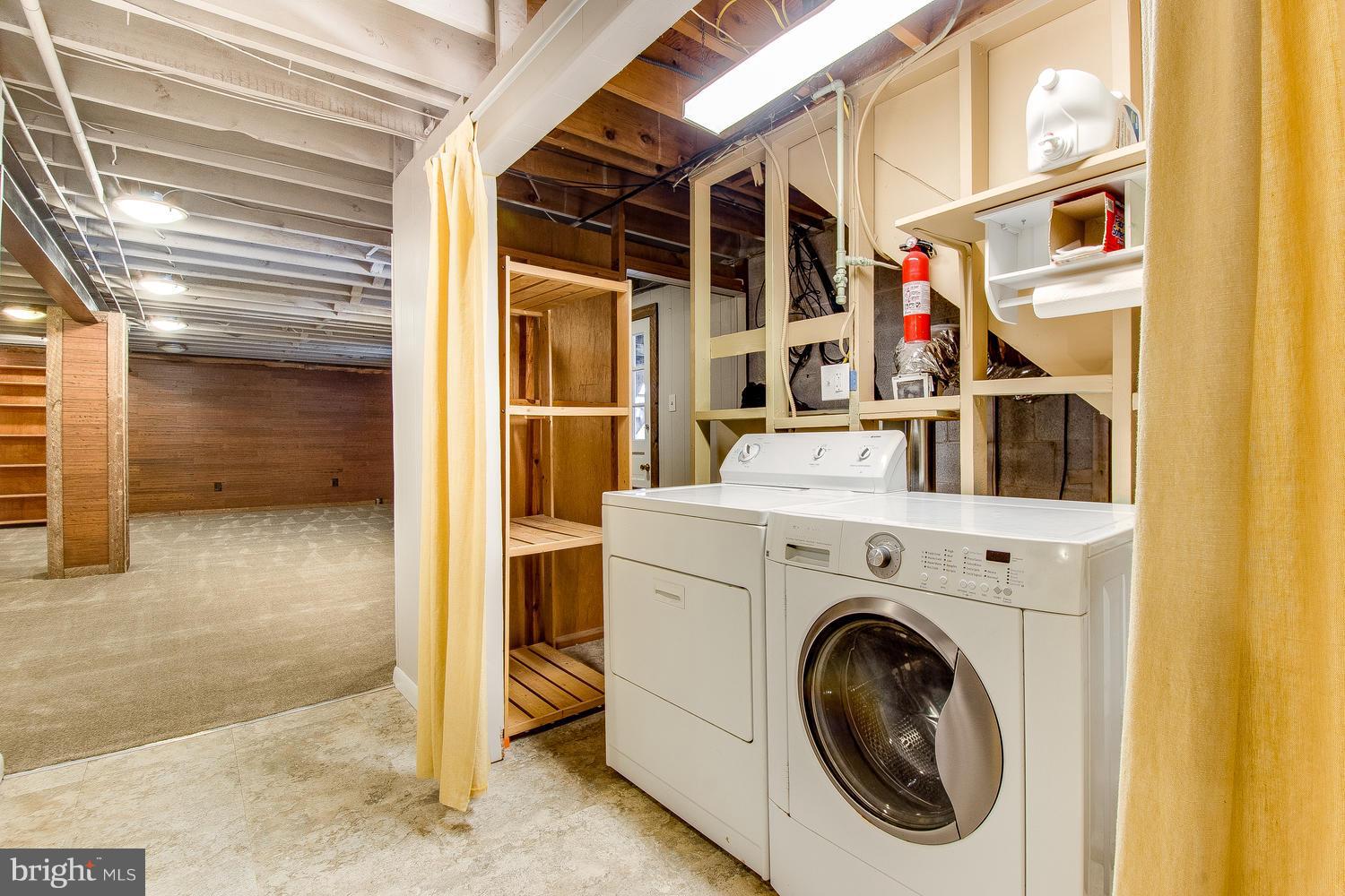 18908 Bloomfield Road Olney, MD 20832 - Photo 24 of 30 a utility room with dryer and washer