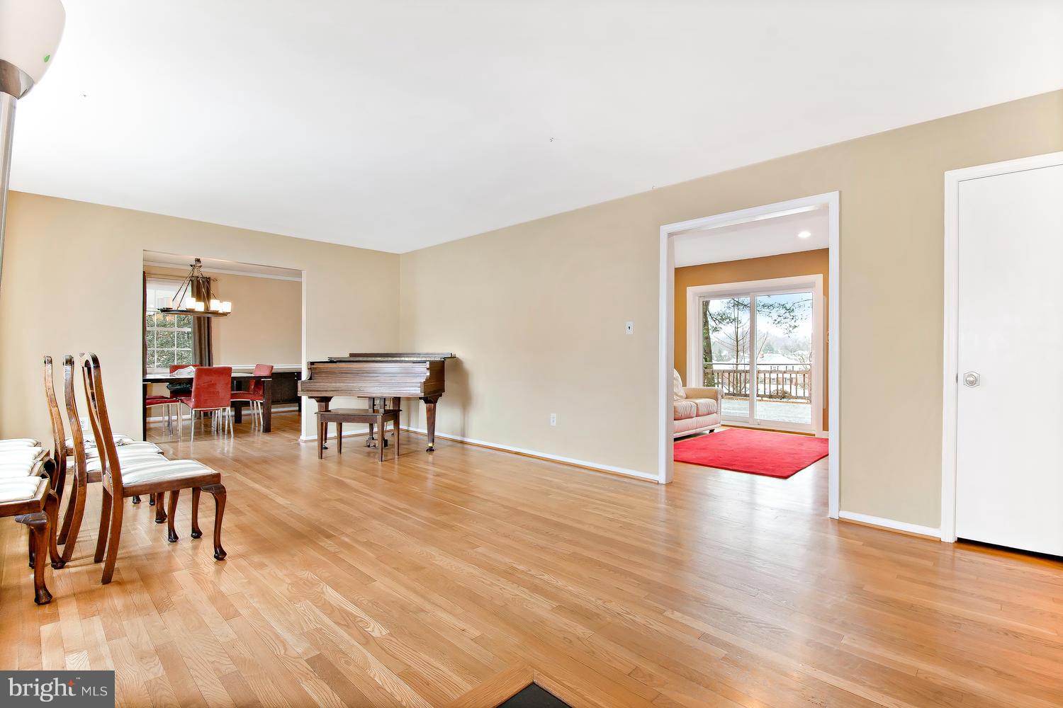 18908 Bloomfield Road Olney, MD 20832 - Photo 9 of 30 a living room with furniture and wooden floor