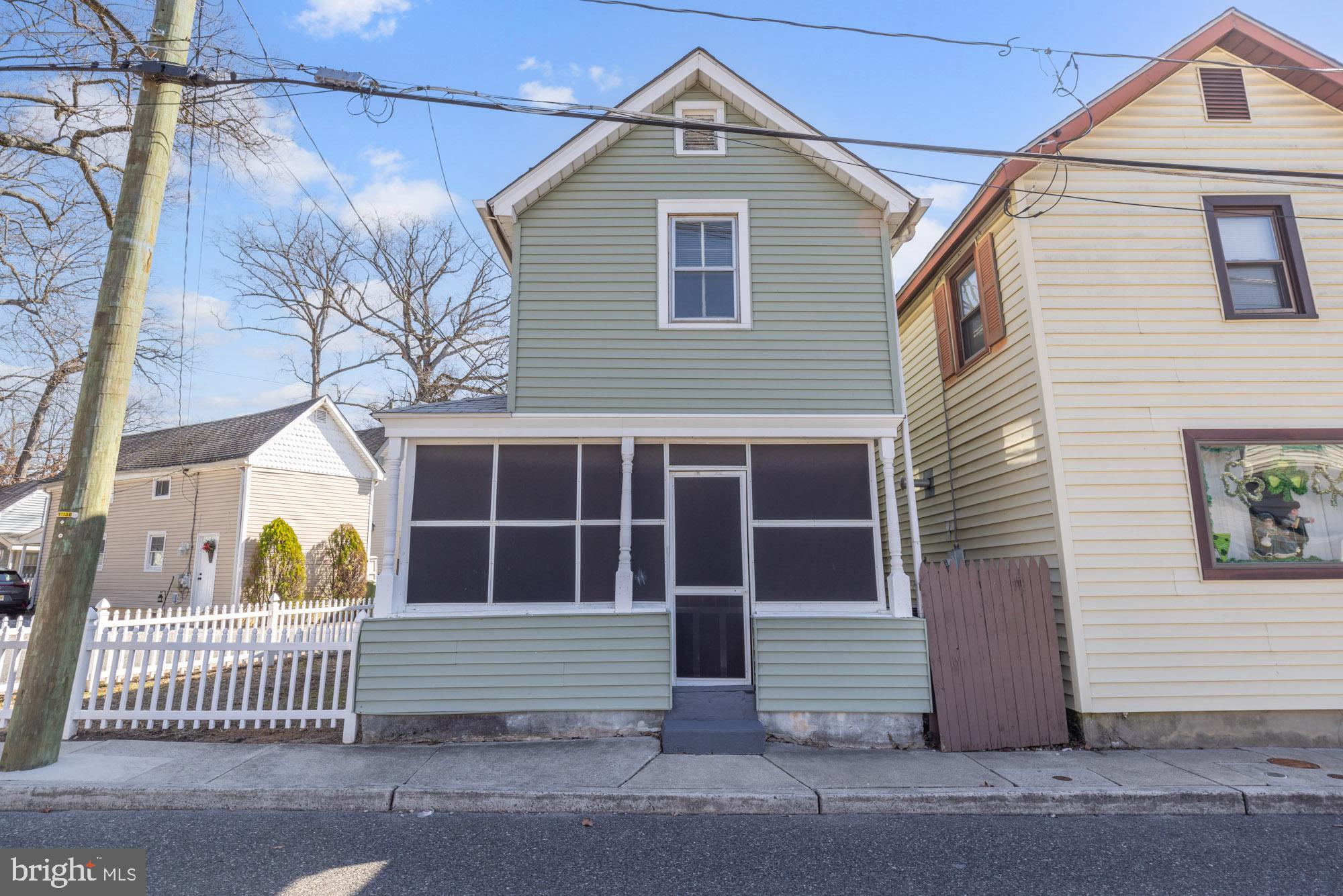 a front view of a house with a garage