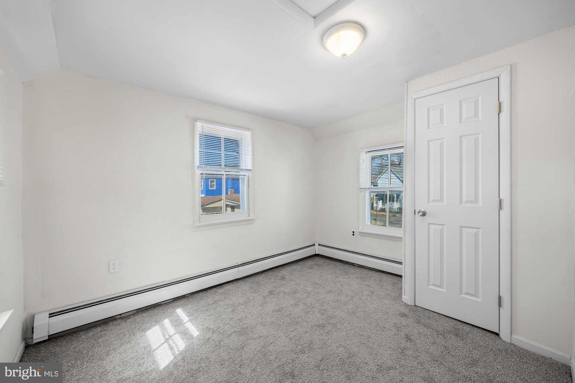 131 North Avenue Pitman, NJ 08071 - Photo 15 of 17 an empty room with windows