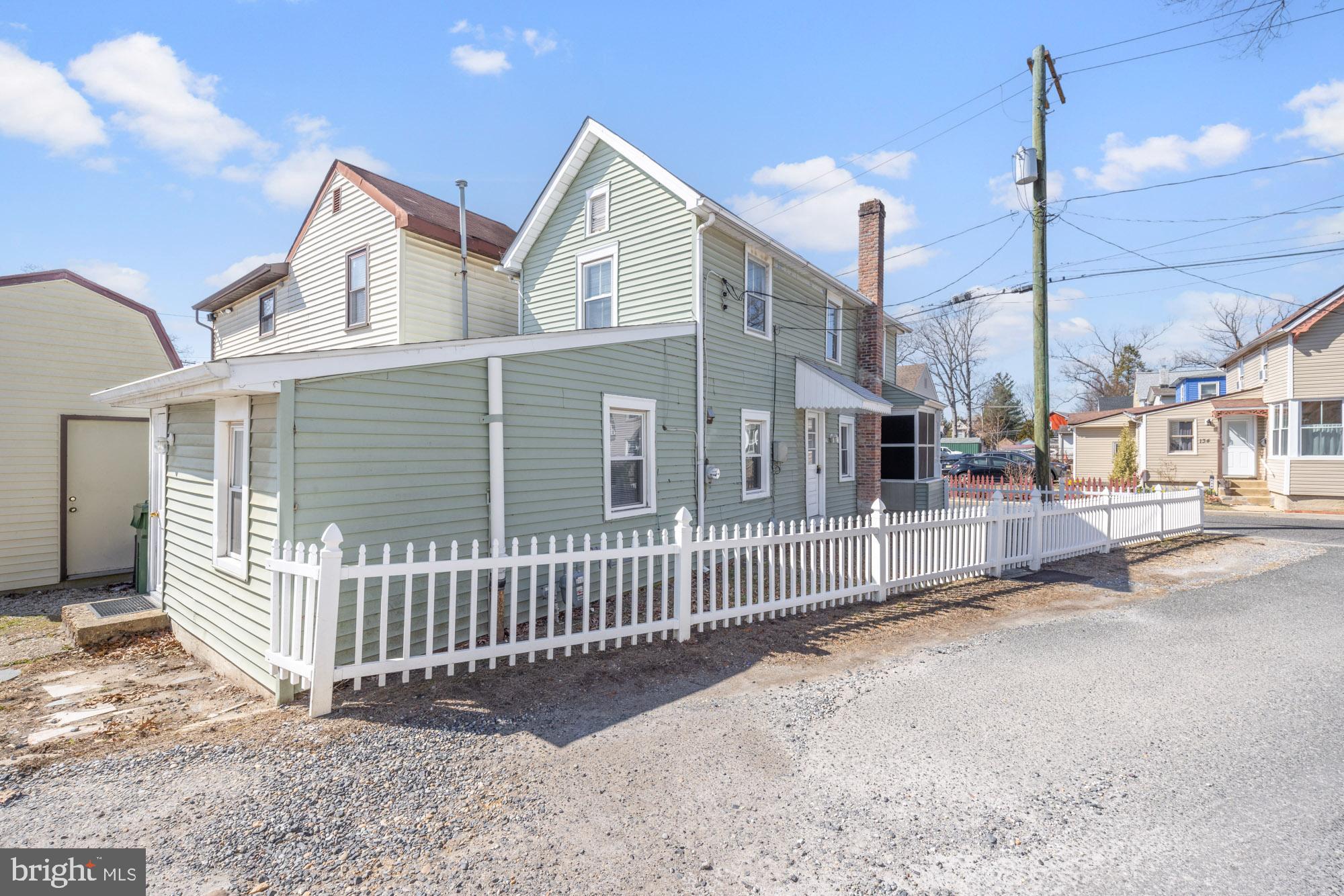 131 North Avenue Pitman, NJ 08071 - Photo 3 of 17 a view of a house with a fence