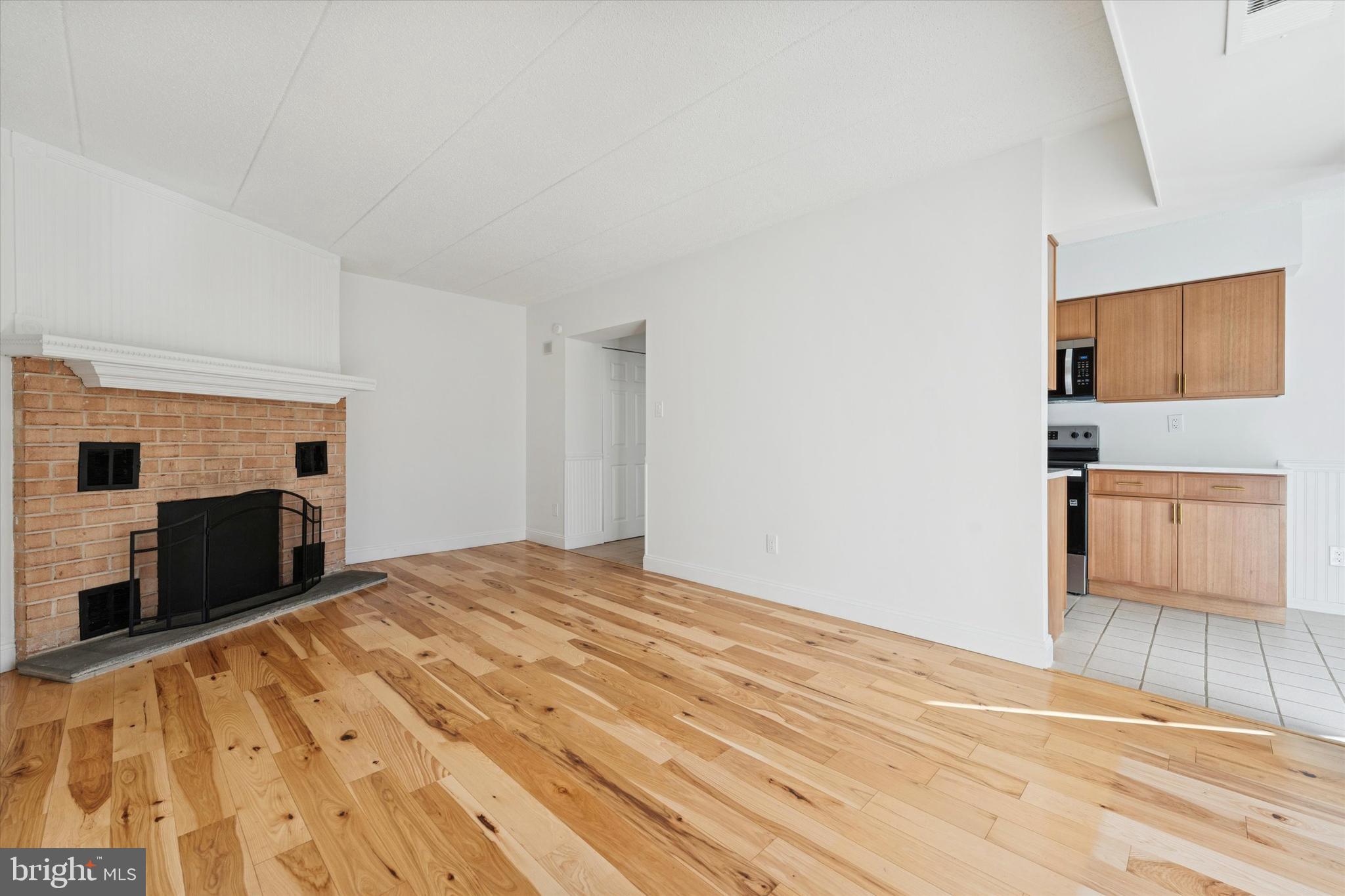612 Washington Place, Unit 12 Chesterbrook, PA 19087 - Photo 6 of 15 a view of empty room with wooden floor