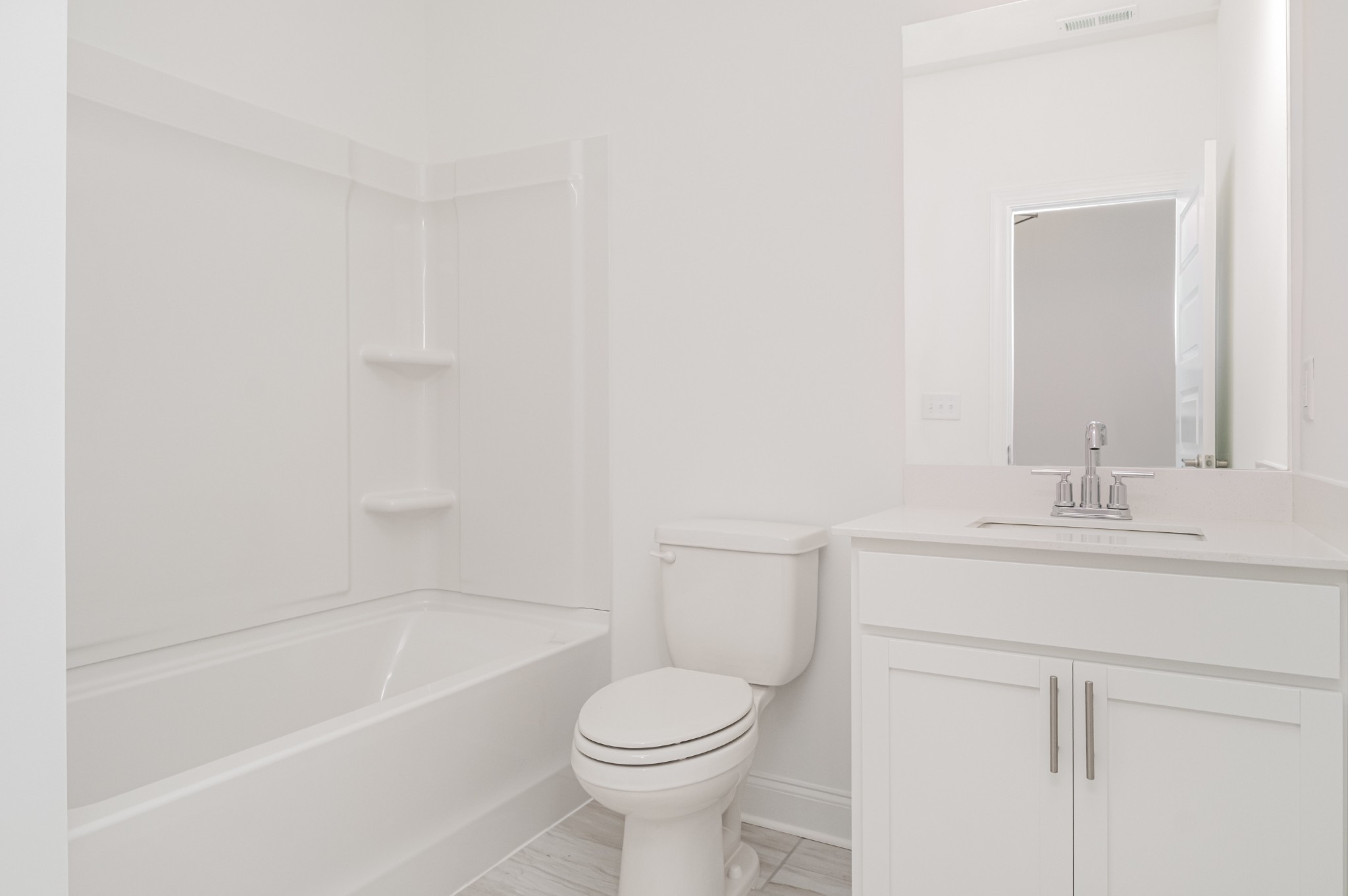 6425 Waymeet Dr Spring Hill Spring Hill, TN 37174 - Photo 14 of 40 a bathroom with a sink toilet and vanity