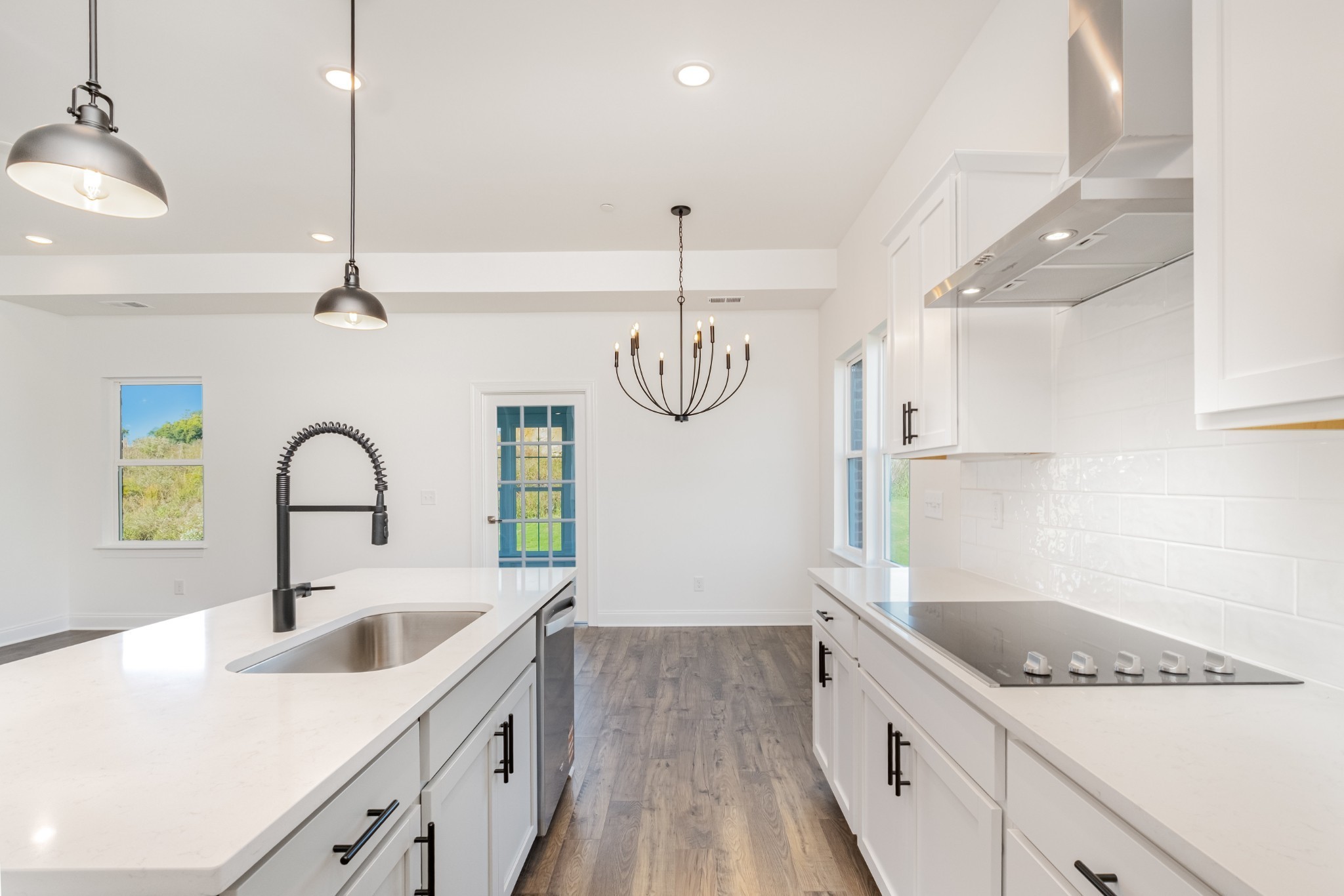 6425 Waymeet Dr Spring Hill Spring Hill, TN 37174 - Photo 9 of 40 a kitchen with a sink stove and cabinets