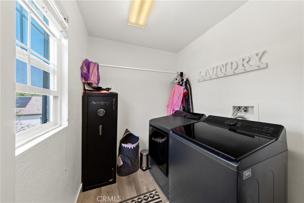 32985 Novara Court Temecula, CA 92592 - Photo 43 of 56 Indoor Laundry Room With Built-In Storage And Utility Space