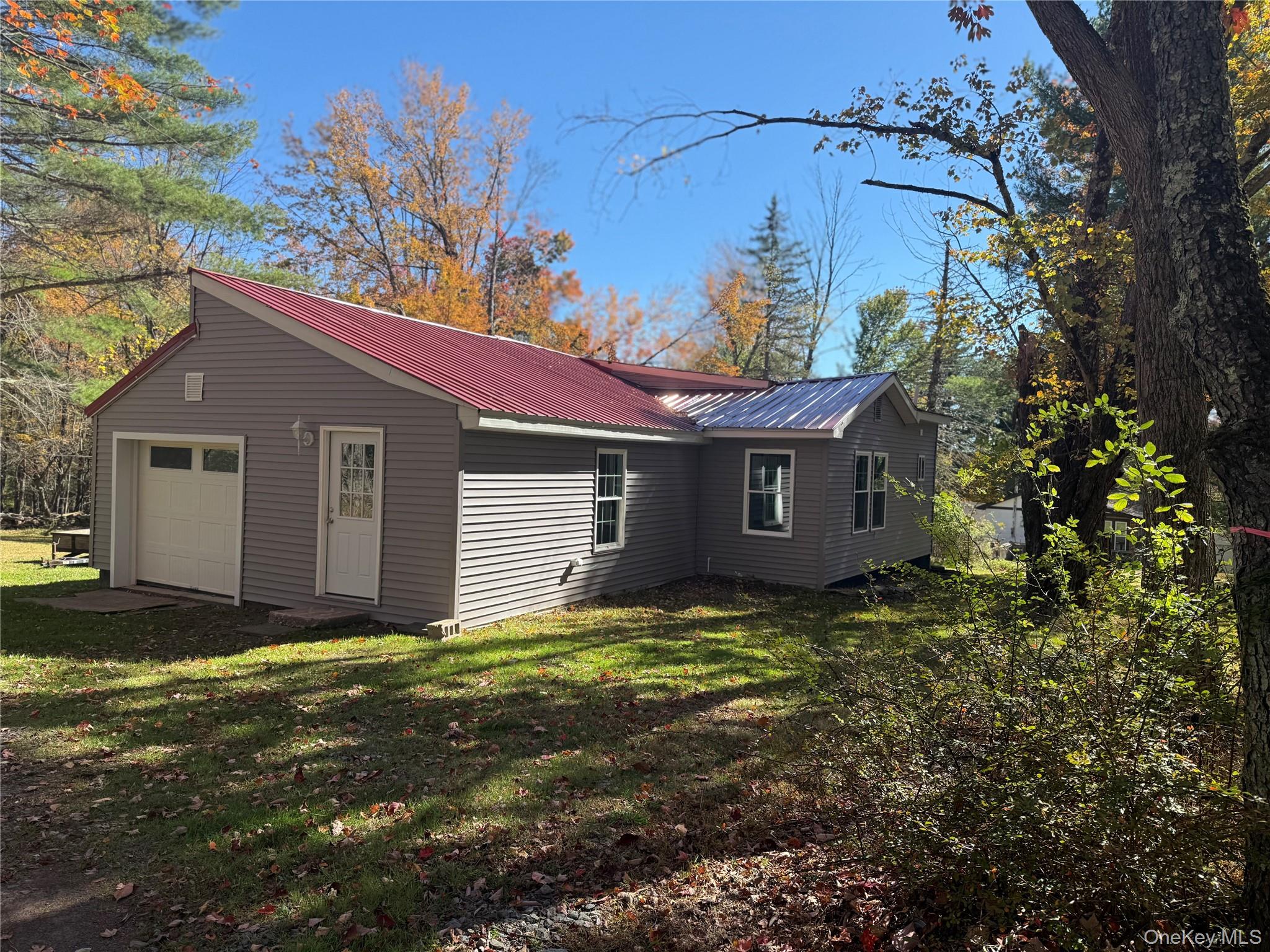 553 Cold Spring Road Monticello, NY 12701 - Photo 1 of 15 a view of a house with a yard