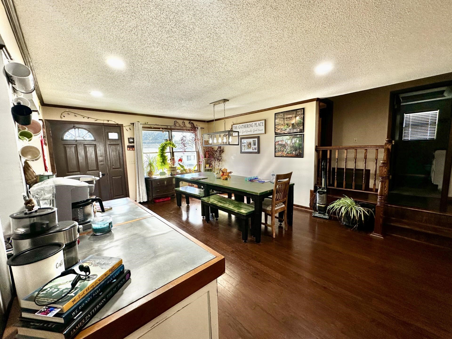 919 3rd Avenue Fulton, IL 61252 - Photo 12 of 24 a living room with furniture and wooden floor