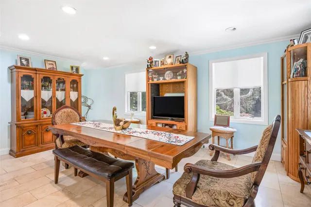 a workspace with furniture and window